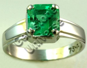 Rich Spring Green colored Colombian Emerald set in 18 K White Gold Ring.Gemstoneuniverse.com