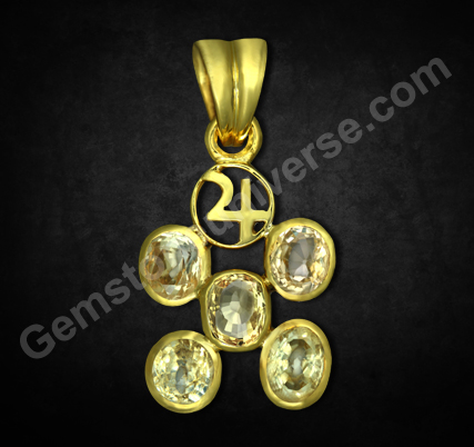 Exhibit showing a Jupiter Talisman having fine unheated Yellow Sapphires and sacred Jupiter Symbol. Unique implementation of Gem Therapy without compromising on Gem Quality