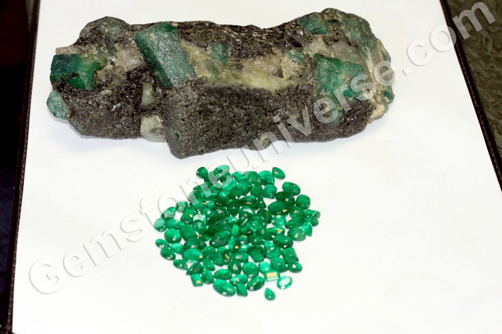 Zambian emerald rough with what the potential yield would look like.