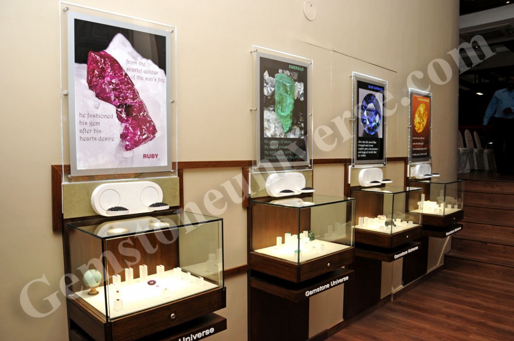 Section of the Gemstoneuniverse store telling the story of The Big Three of the colored Gemstone World - Rubies, Emeralds and Sapphires. The last display showcases Yellow Sapphire, the Gemstone of Brihaspati.